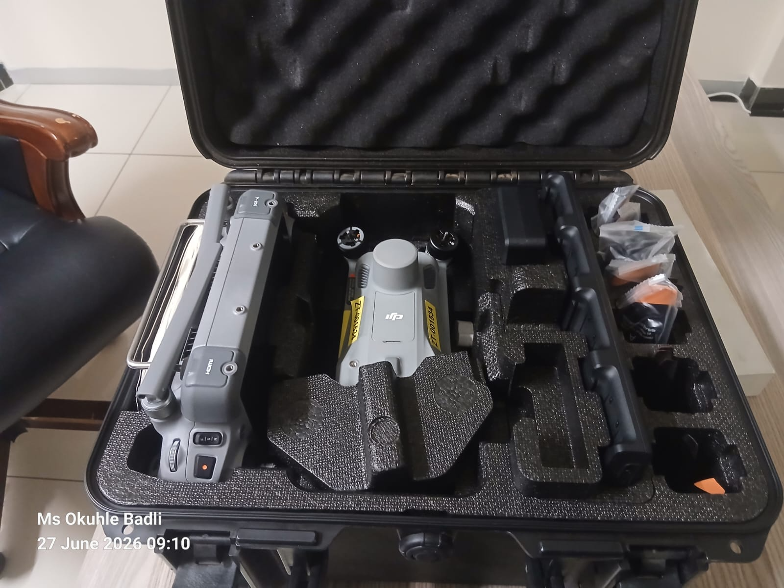 Actual DJI Matrice 4T kit in its open hard case with controller and pictured accessories